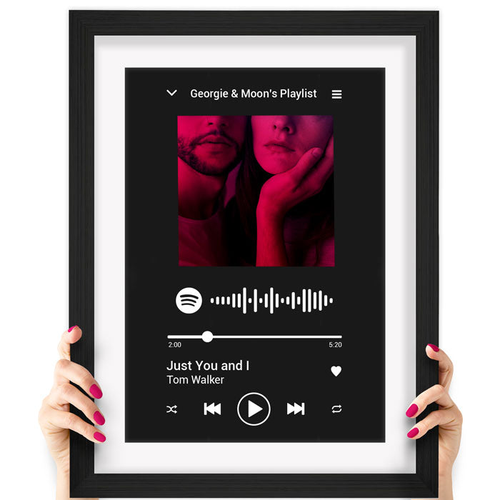 Black Spotify poster-in-black frame