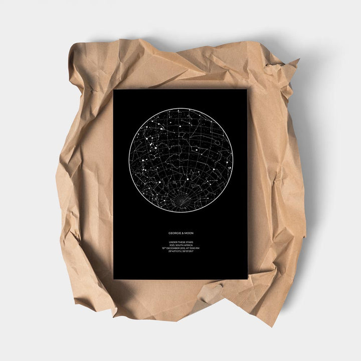 Star map on black background with grid and constellations