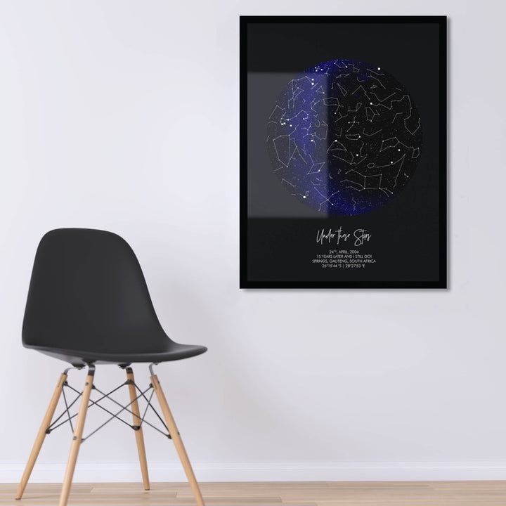 Black Framed star map with constellation lines on wall 